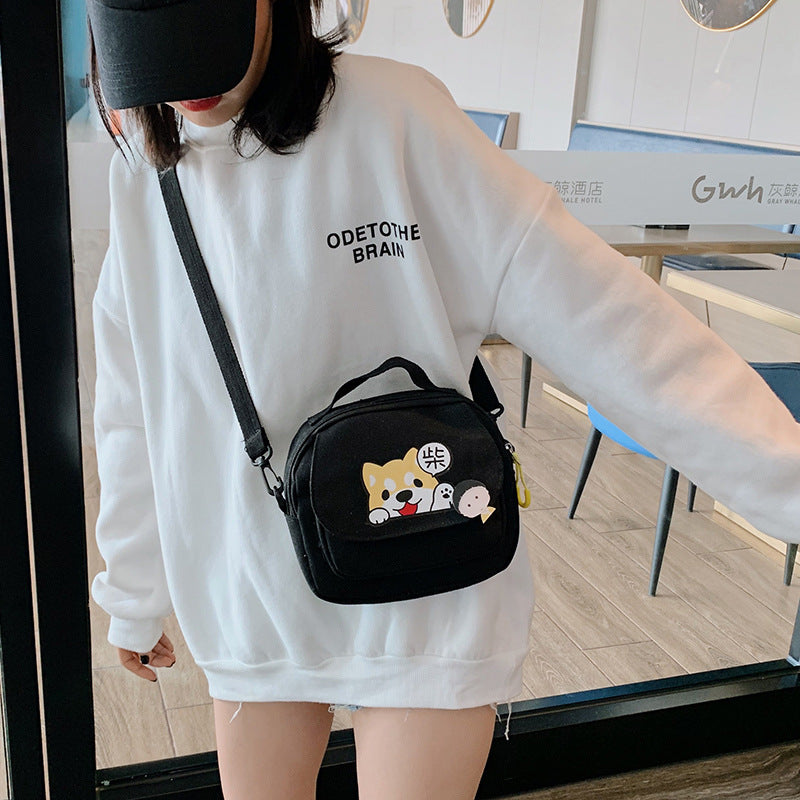 Students Carry Small Square Canvas Bags Across One Shoulder