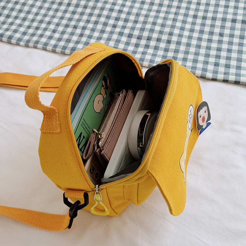 Students Carry Small Square Canvas Bags Across One Shoulder
